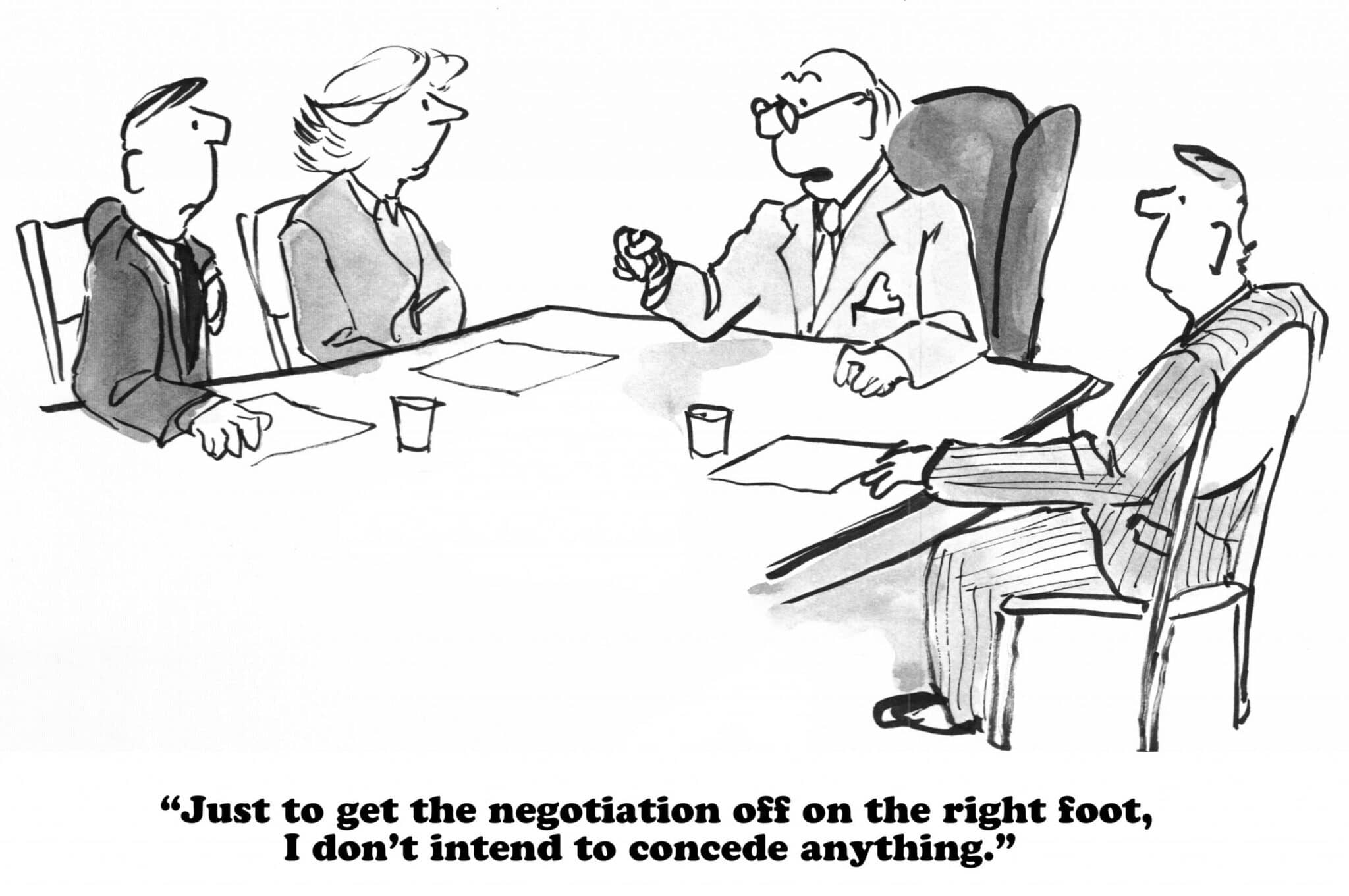 attorney with clients at a negotiations meeting